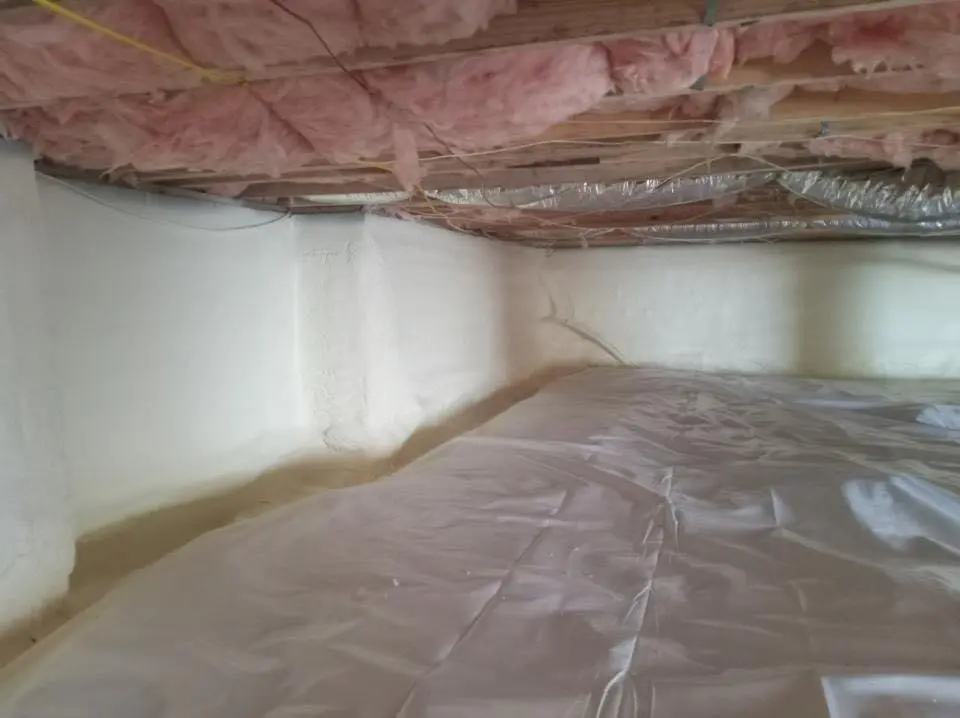 Crawl space encapsulation with closed-cell spray foam for Roof Maintenance in Malverne